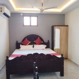 Deluxe room at Amrith Residency, best hotel in Pondicherry with modern amenities